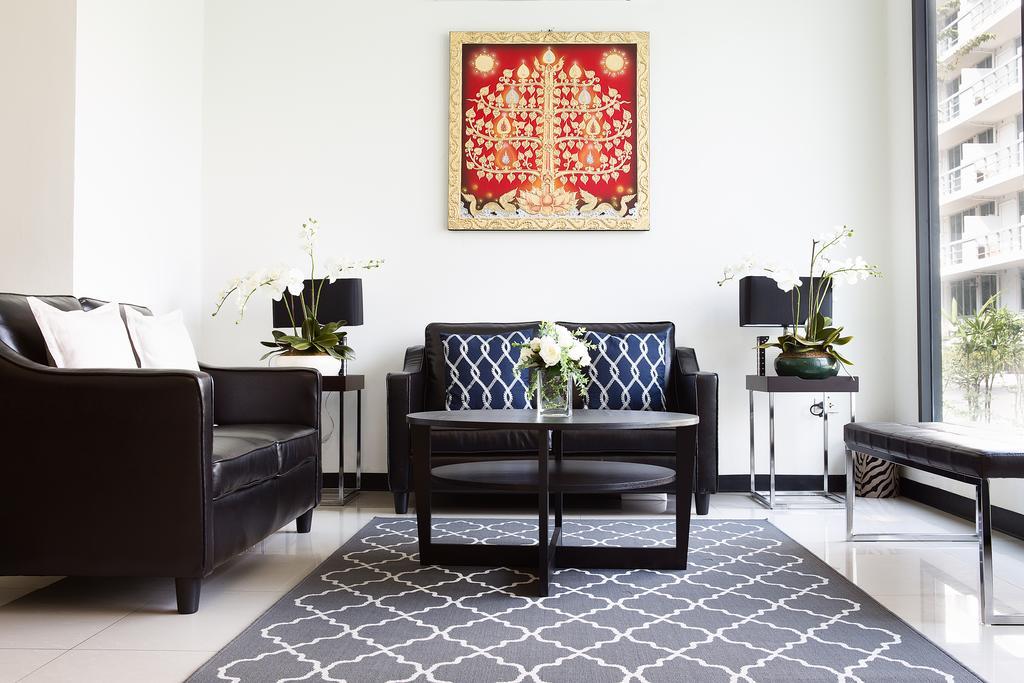 The Capital Resort @ Sukhumvit 50 Μπανγκόκ Εξωτερικό φωτογραφία A living room in a condominium
