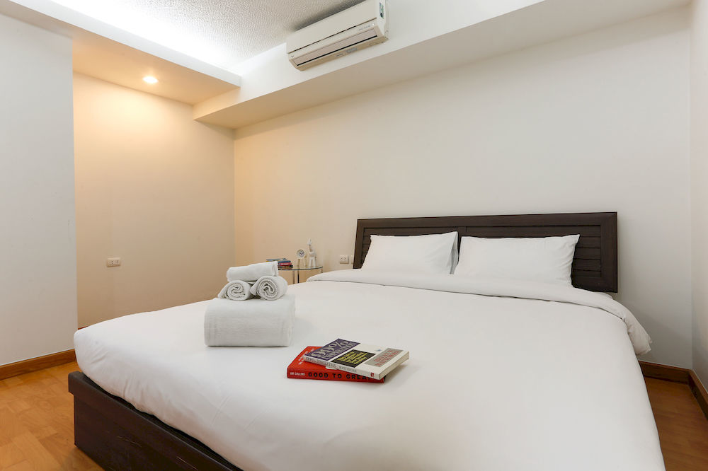 The Capital Resort @ Sukhumvit 50 Μπανγκόκ Εξωτερικό φωτογραφία A bedroom at a hotel in Bangkok, Thailand