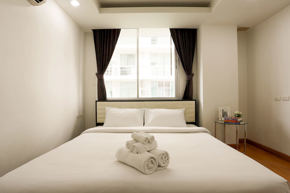 The Capital Resort @ Sukhumvit 50 Μπανγκόκ Εξωτερικό φωτογραφία A bedroom at a hotel